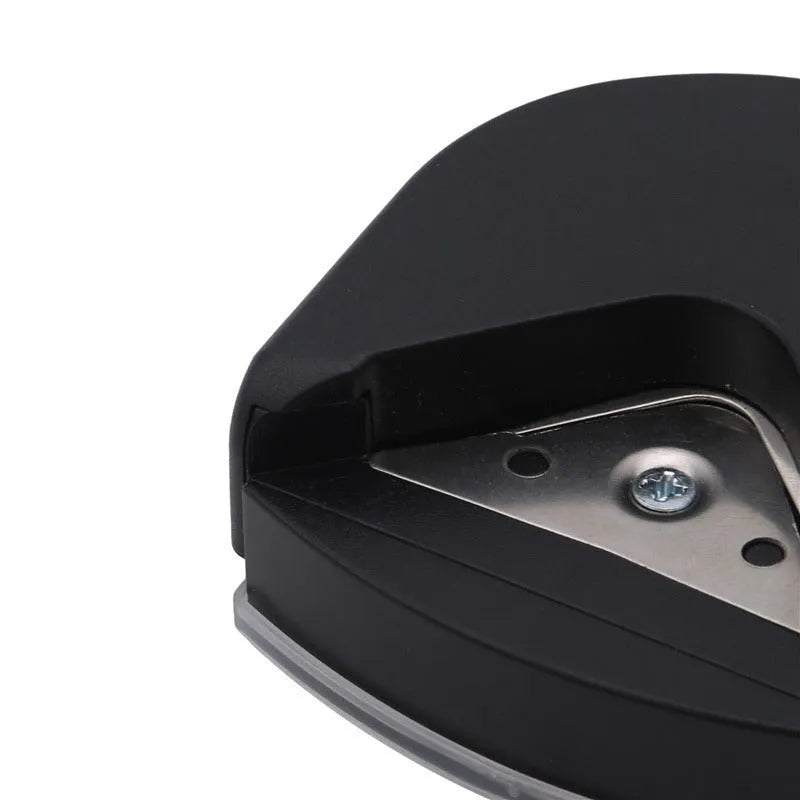 Corner cutter for paper cards and photos, plastic and metal, 5.8cm by 5.4cm by 2.5cm, in black, pink, or blue