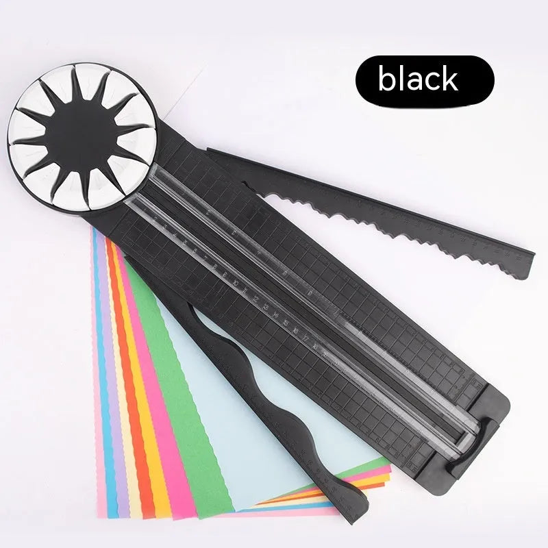 12-in-1 plastic paper cutting machine with dotted board in pink or black, measuring 46.2 cm long