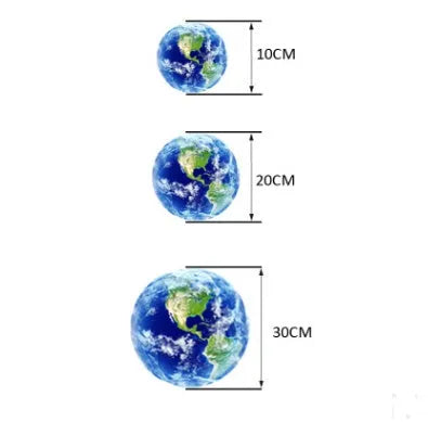 Glow in the dark 3D planet Earth wall sticker in multiple sizes on a bedroom wall.