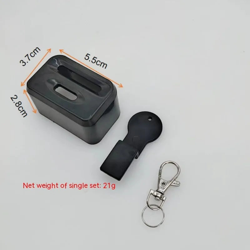 Black plastic seat belt buckle holder clip for car seat belt organisation