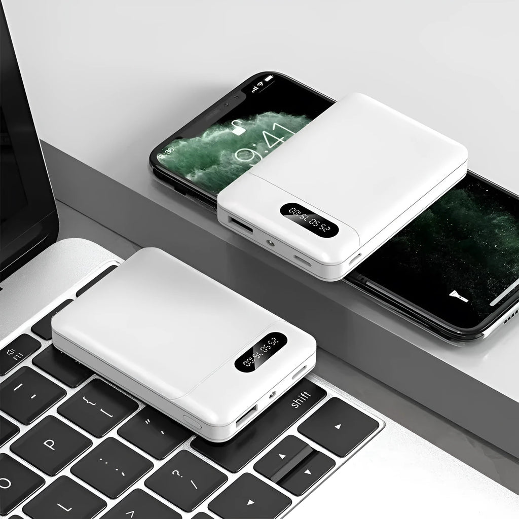 Black and white portable power bank showing compact rectangular design with USB ports