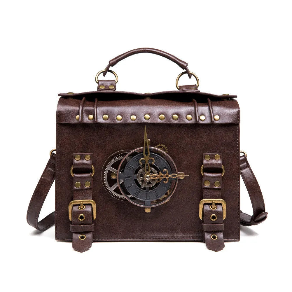 Bronze steampunk pillow shoulder bag with metal hardware on a textured PU leather surface.