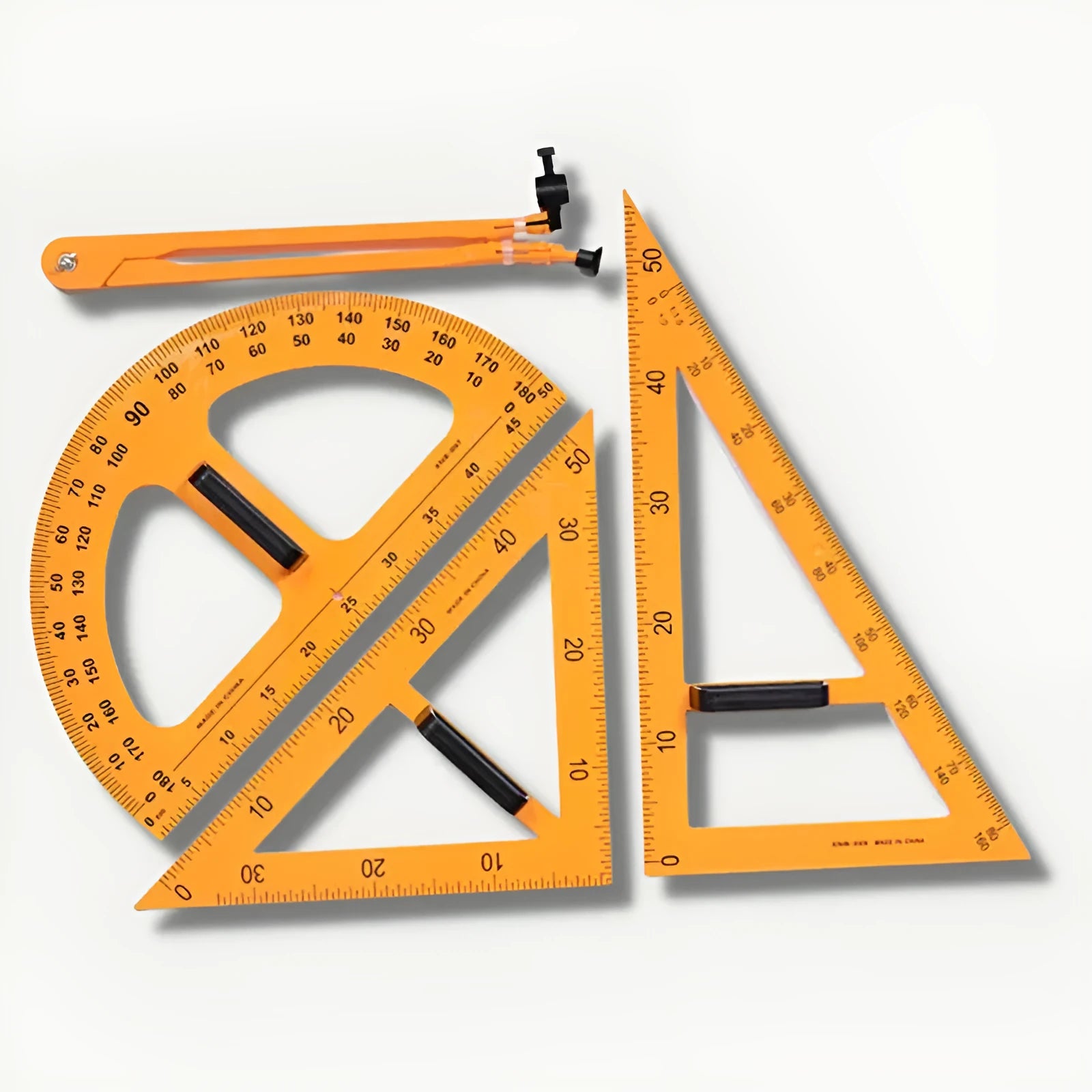 Orange and black plastic mathematics teaching tools set with triangle rulers, protractor and chalk compass