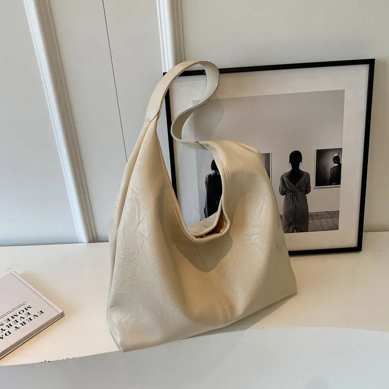 Soft leather large capacity shoulder bag in street trend style with sewing thread detailing