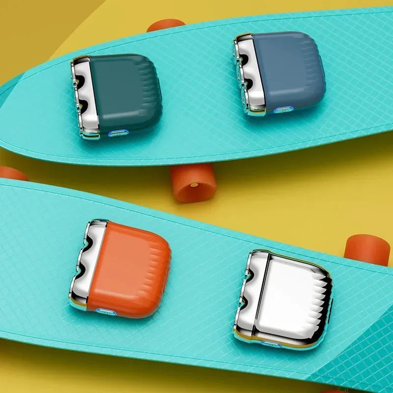 Three-head mini electric shaver in gun metal, orange, green, or blue colours