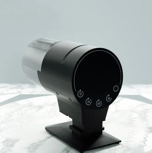 Black automatic aquarium fish feeder with 210ml silo, plastic body, 2 No. 5 battery power