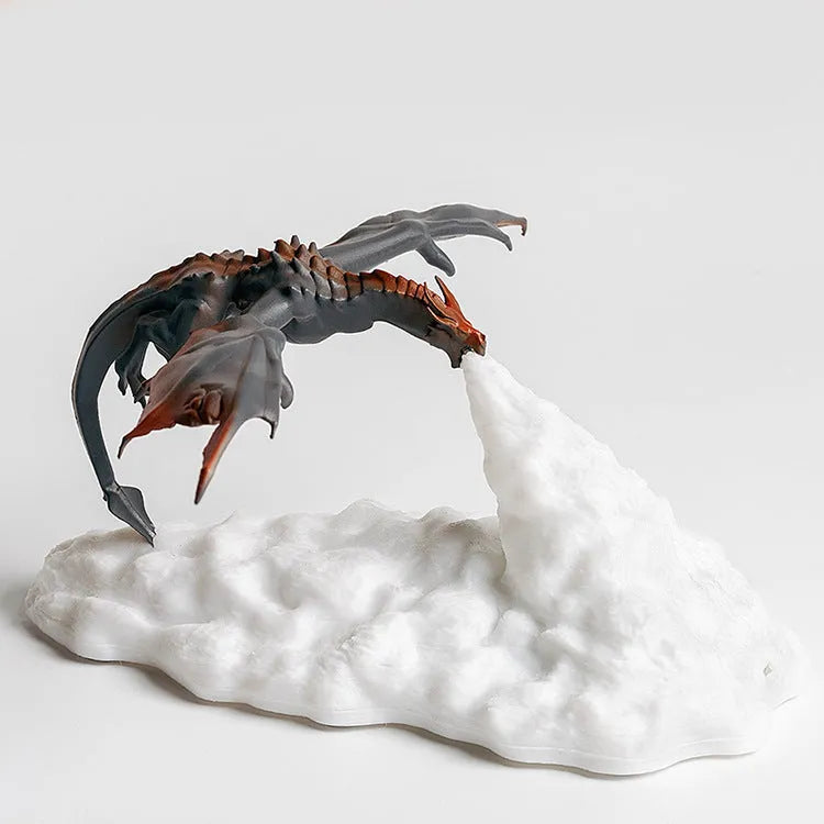 3D printed fire-breathing dragon night light with red glowing effect on a dark surface.