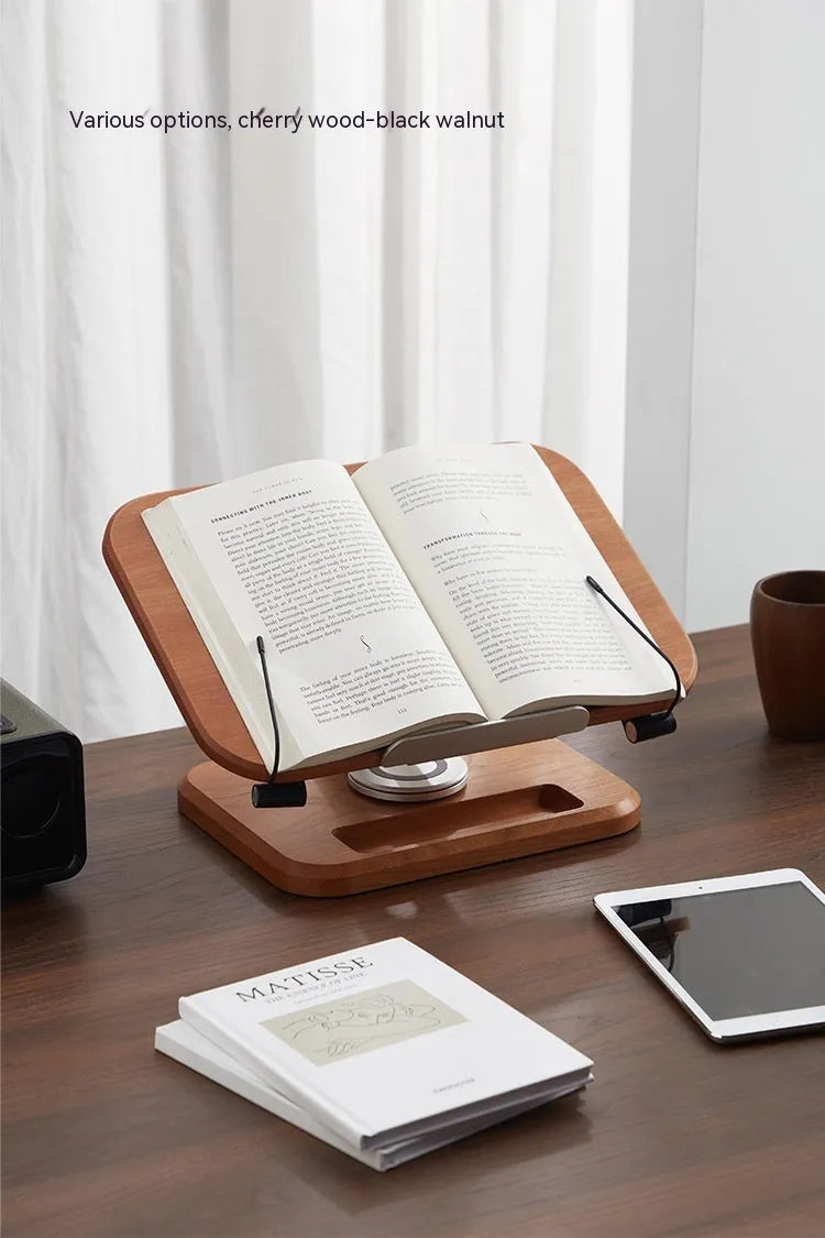 Solid wood adjustable reading rack in walnut colour holding a book at an angle.