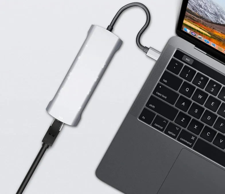 Grey aluminium USB-C docking station with HDMI, VGA, USB 3.0 ports and 140mm cable