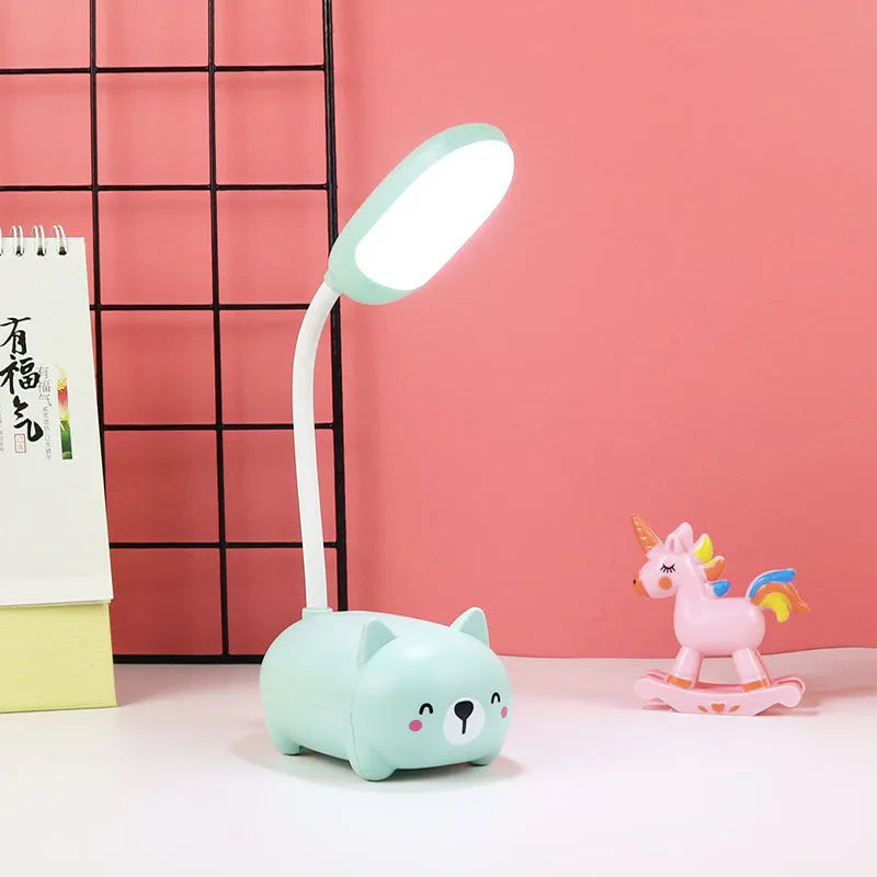 USB rechargeable LED book light in warm white, available in blue or pink with animal designs