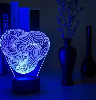 3D abstract acrylic LED night light with ABS base, USB cable, seven colours, and optional remote control