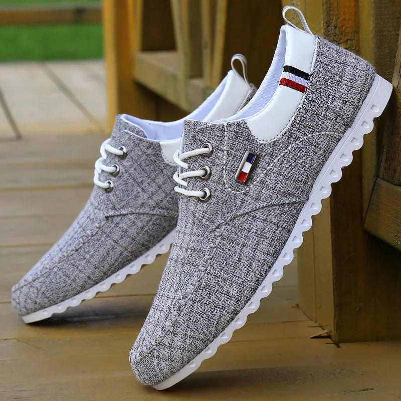 Hemp upper autumn sailing shoes in black with car suture pattern and shallow mouth