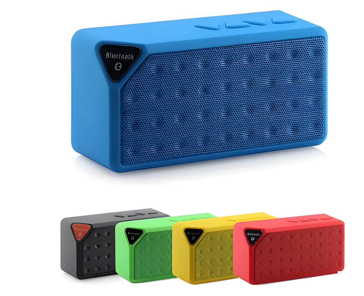 Cannon X3 portable wireless Bluetooth speaker with FM radio in multiple colours on outdoor ground