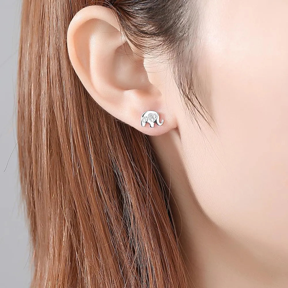 Geometric silver Korean ladies earrings with gem setting, in gold and silvery colours.