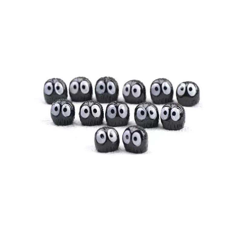 Small black resin coal briquette car decoration with cartoon styling