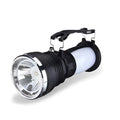 Black solar-panel and USB rechargeable LED flashlight for outdoor and emergency use.