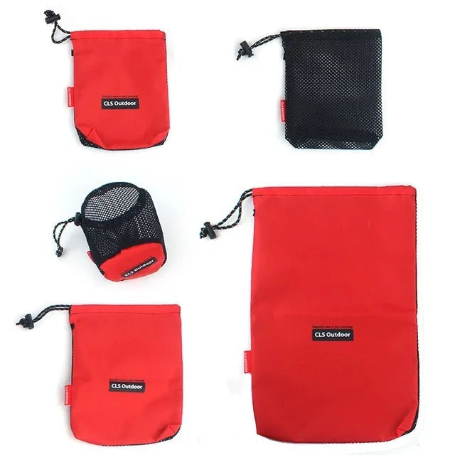 Set of five red outdoor travel storage bags with mesh panels and zipper closures