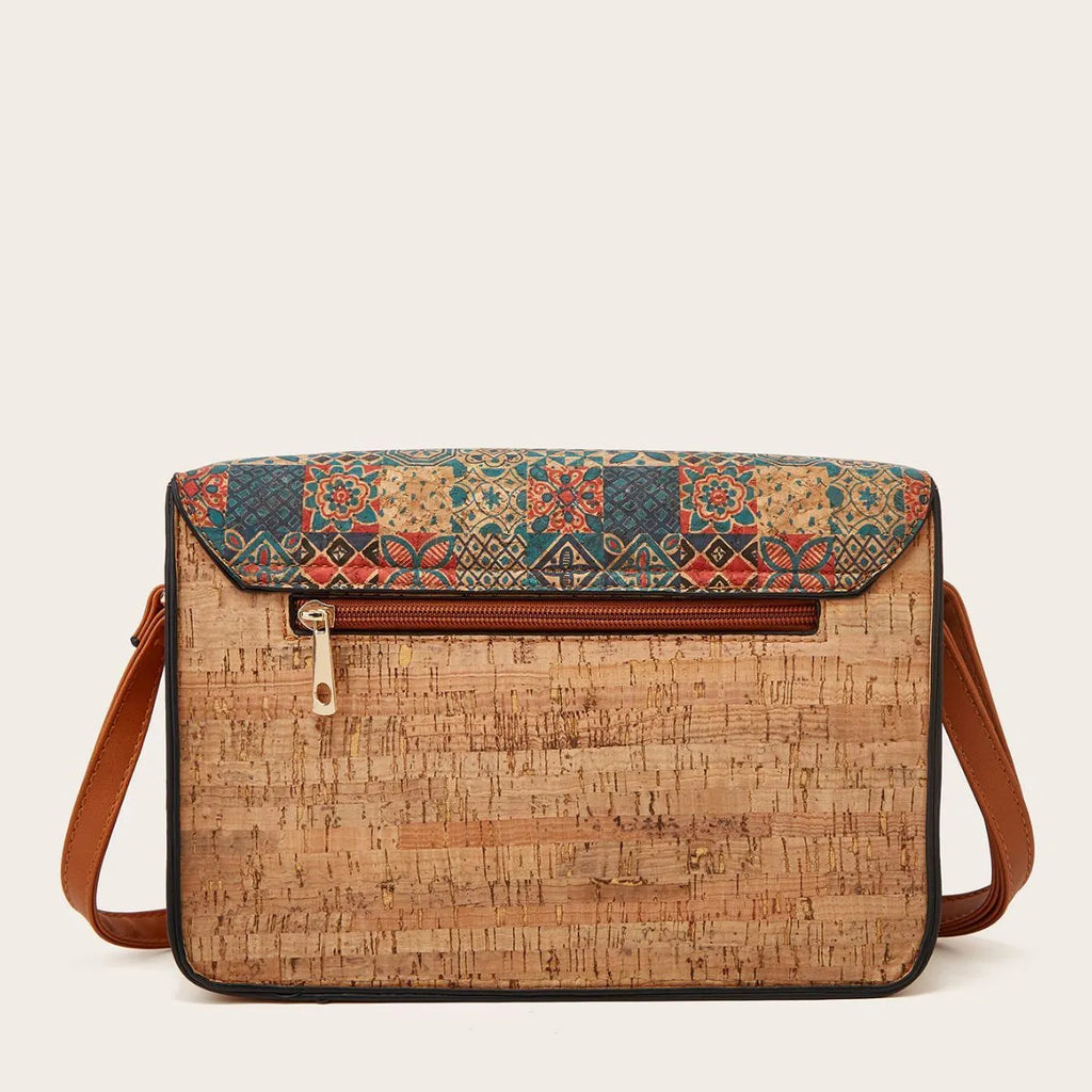 Women's printed PU shoulder bag with adjustable strap shown in four colour variations
