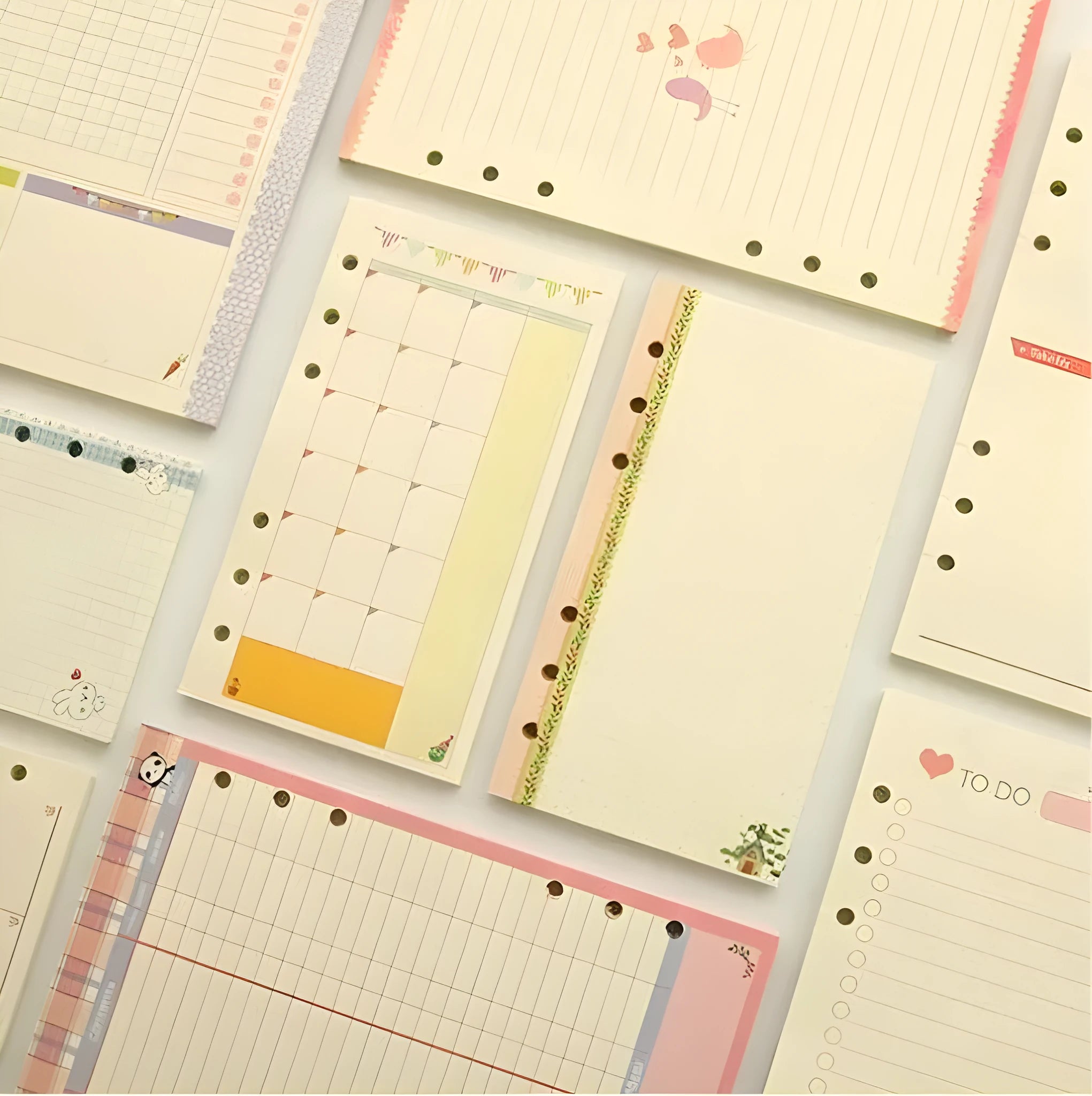 Colored A5 binder filler paper sheets in different styles including lined, grid, and weekly plan