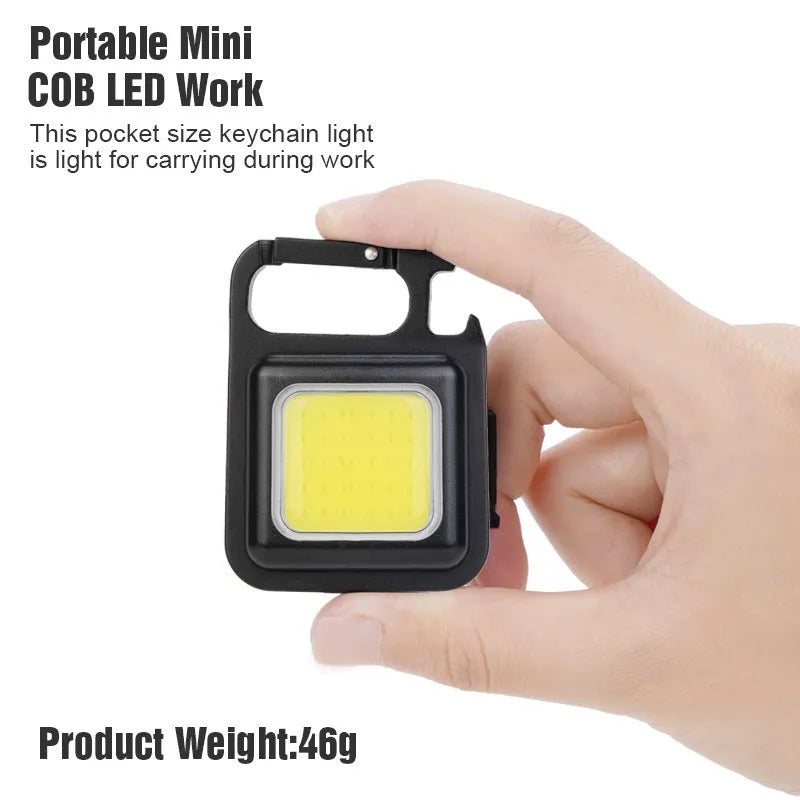 Black aluminium USB rechargeable keychain flashlight with magnetic base and foldable handle