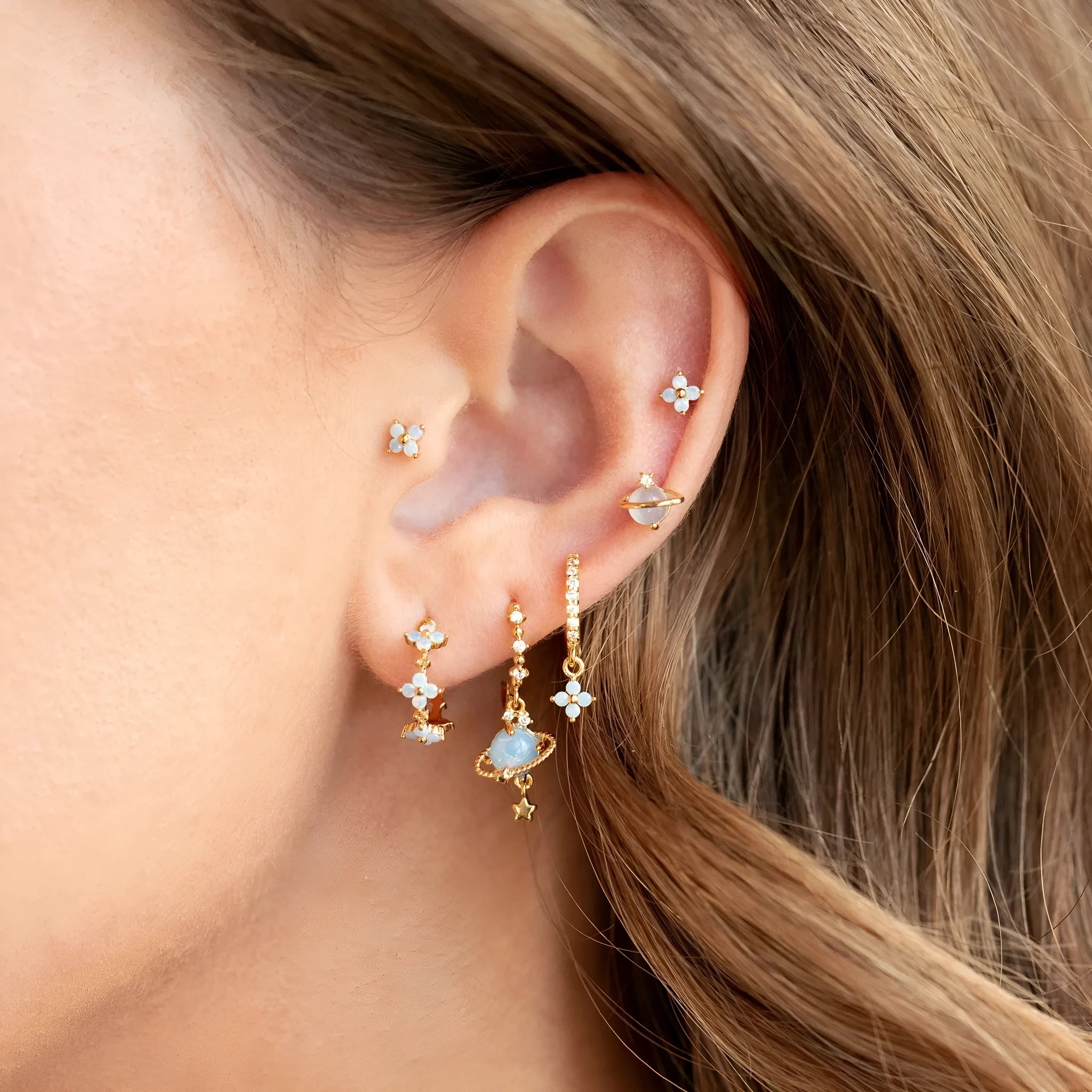 Gold and silver flower nail design ear studs with zircon mosaic accents in Japanese Korean style