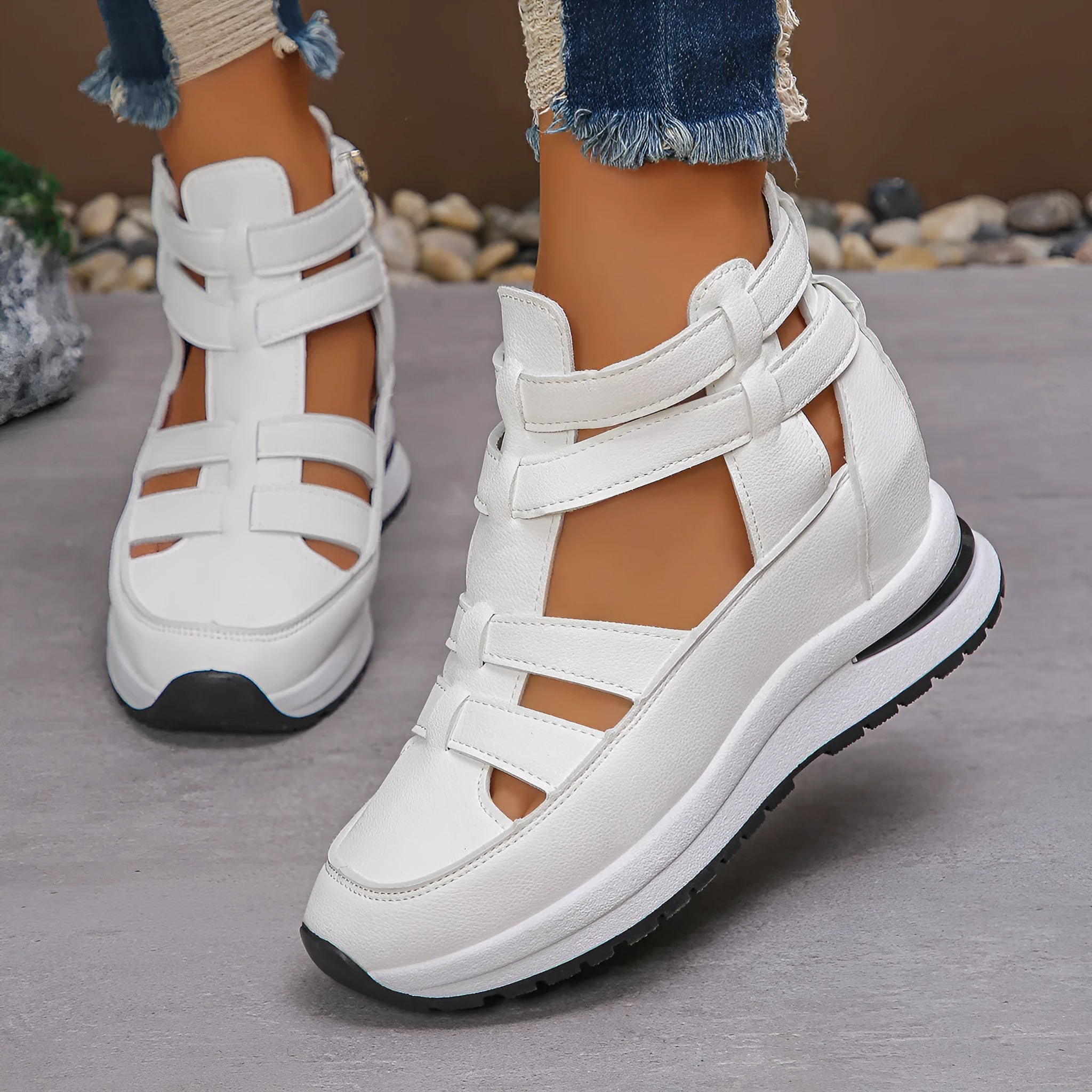 Women's black hollow-out platform sandals with a Velcro strap and round toe.