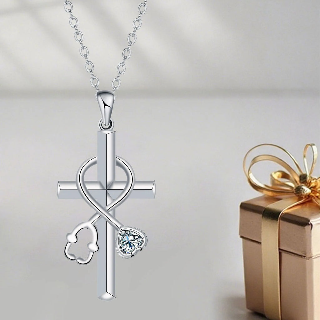 Copper cross stethoscope pendant necklace on a cross chain with electroplated finish.