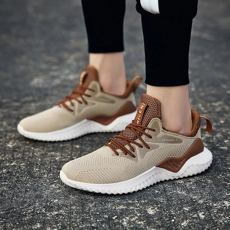 Adult unisex low-top running shoes with breathable mesh upper and front strap closure in multiple colour options