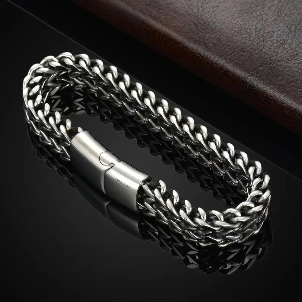 Silver titanium steel men's bracelet with geometric hip hop design on front and back.