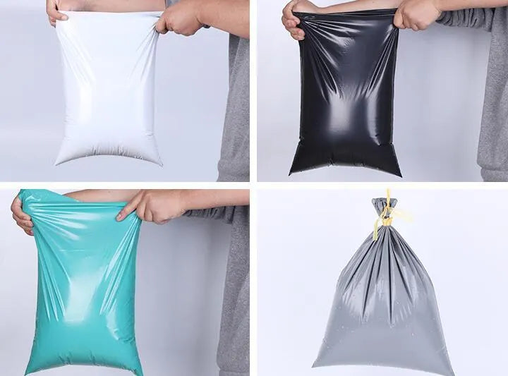 A bundle of 100 clear and coloured PE plastic courier bags with sticker seals for clothing protection.