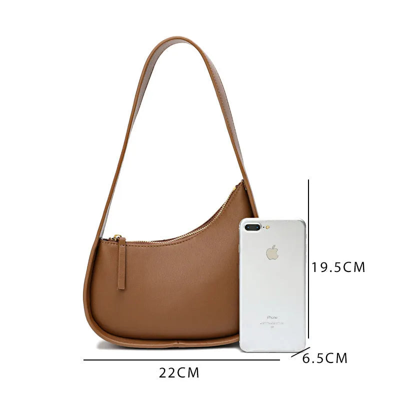 Small genuine leather half-moon women's shoulder bag with wide strap in four colour options