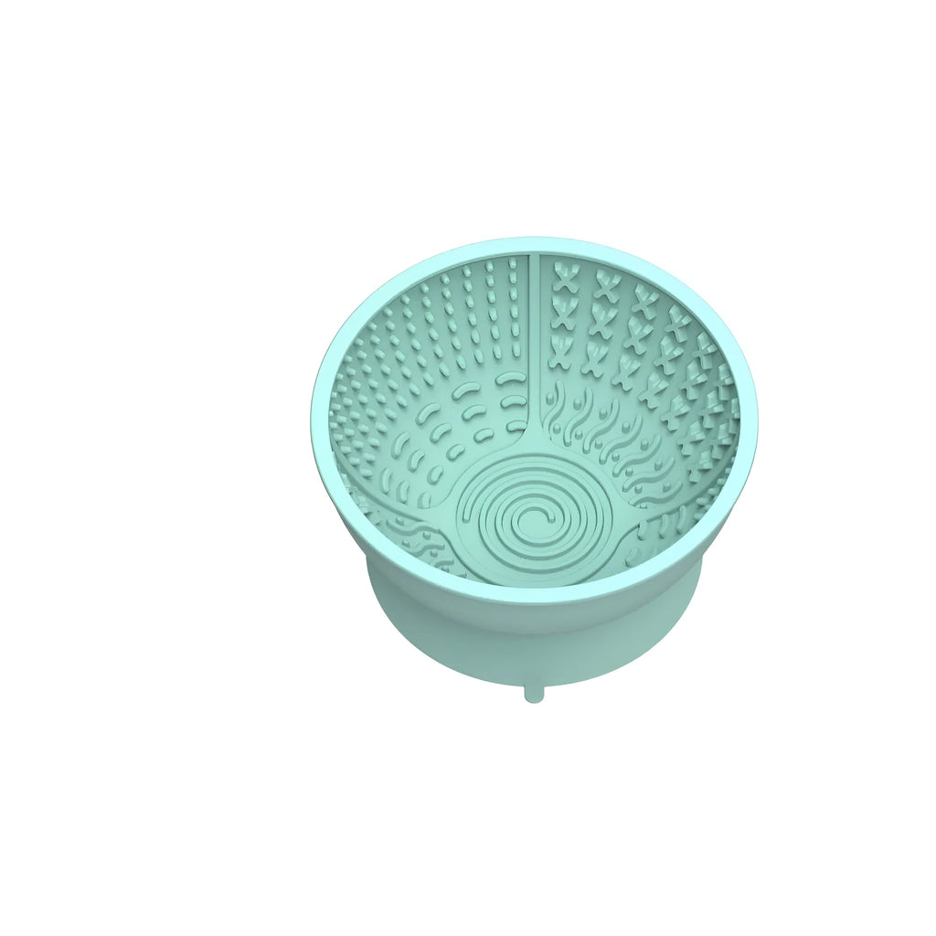 Cyan silicone dog slow feeder bowl with textured licking mat surface and suction cup base
