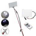 White LED fishing rod light with telescopic pole extended to 5 metres showing remote control
