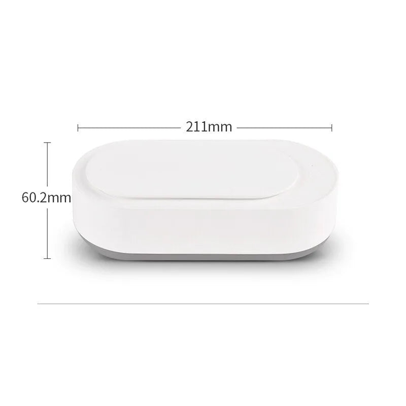 White portable ultrasonic cleaning machine with display and stainless steel tank.