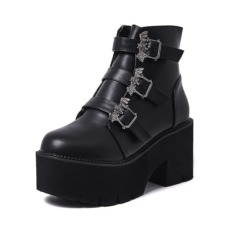 Black women's Harajuku punk ankle boots with a bat-shaped buckle and side zipper.