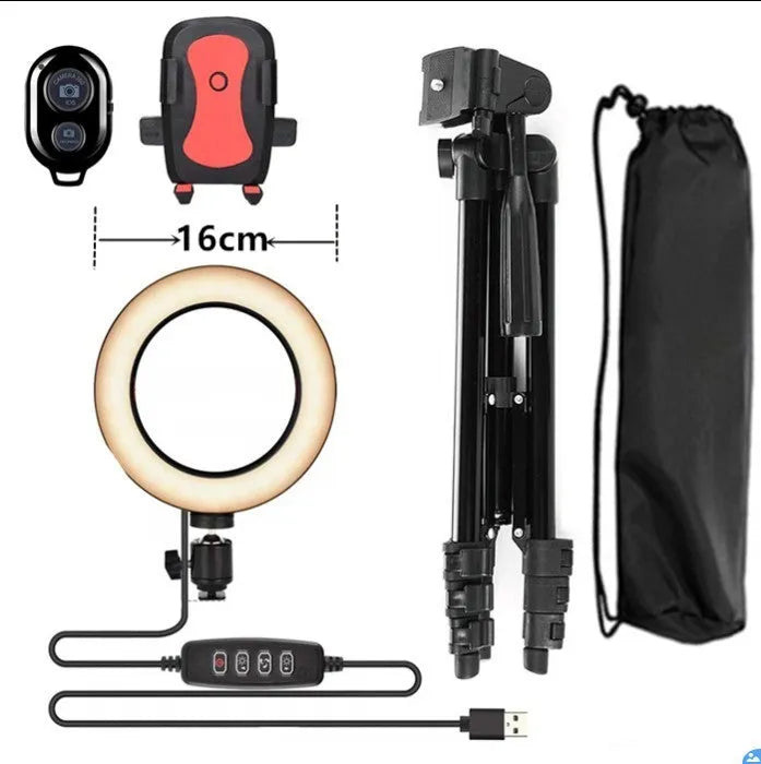 Adjustable silver live phone stand extended to mid-height with a phone secured in the clip