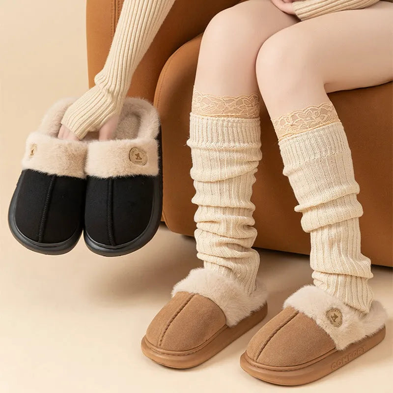 Plush winter home slippers for women and men with non-slip PVC sole, available in black, blue, brown, khaki, and pink.