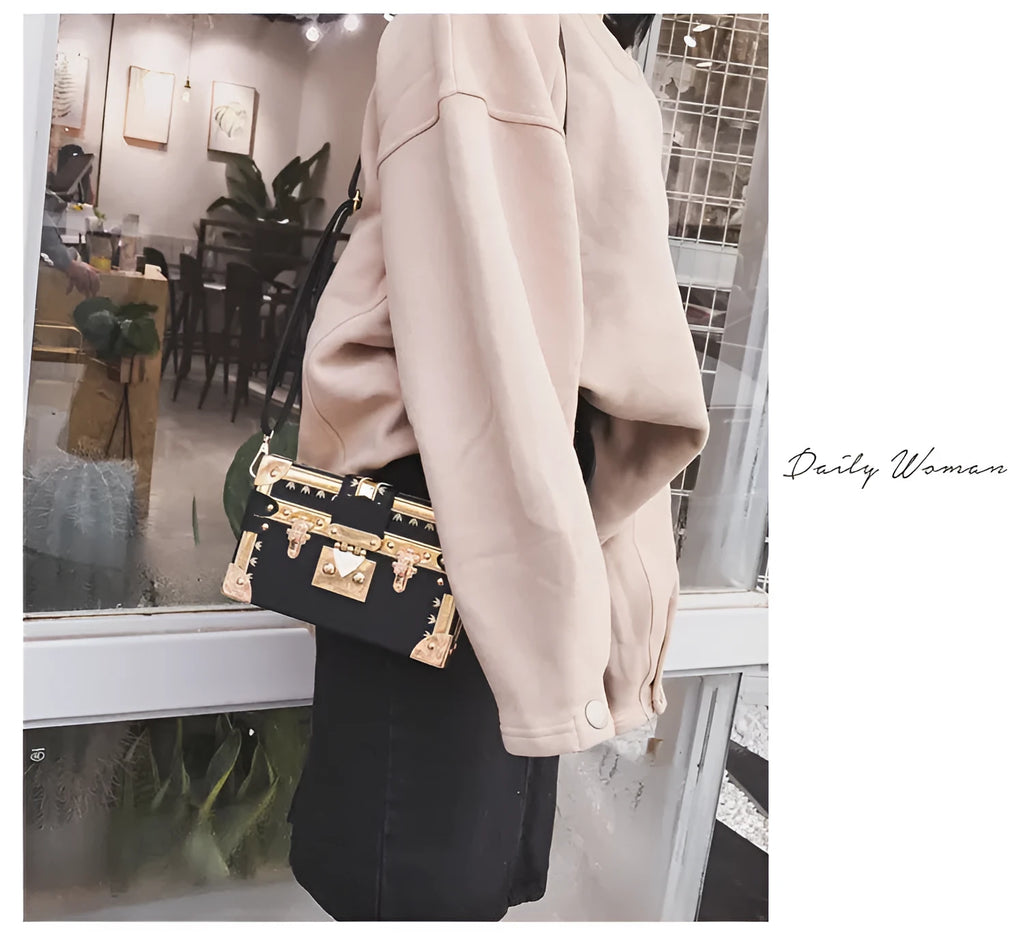 Black hard case PU leather women's shoulder bag with flap closure and cross-body strap