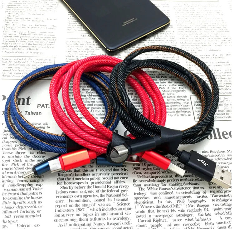 Denim braided USB-C charging cable with aluminium connectors shown in black, blue, and red colour options.