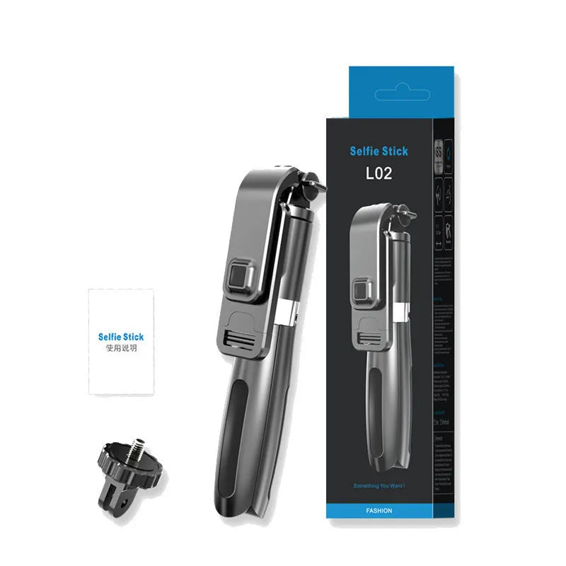 Extended black Bluetooth selfie stick with phone attached, showing wireless remote and tripod base deployed.