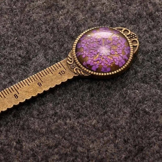Handmade dried flower ruler bookmark with gypsophila, daffodil, lace flower, and clover on 12cm base in multiple colours.