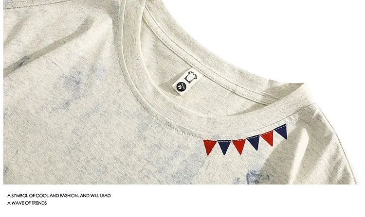 Gray tie dye T-shirt with all-over paint print design, loose fit with short sleeves and round neck