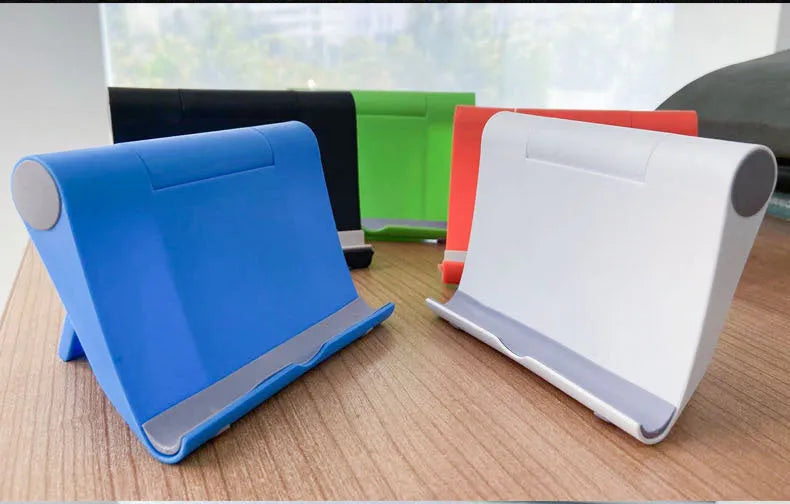 Black PE folding phone and tablet stand on a desktop, adjusted to a viewing angle.