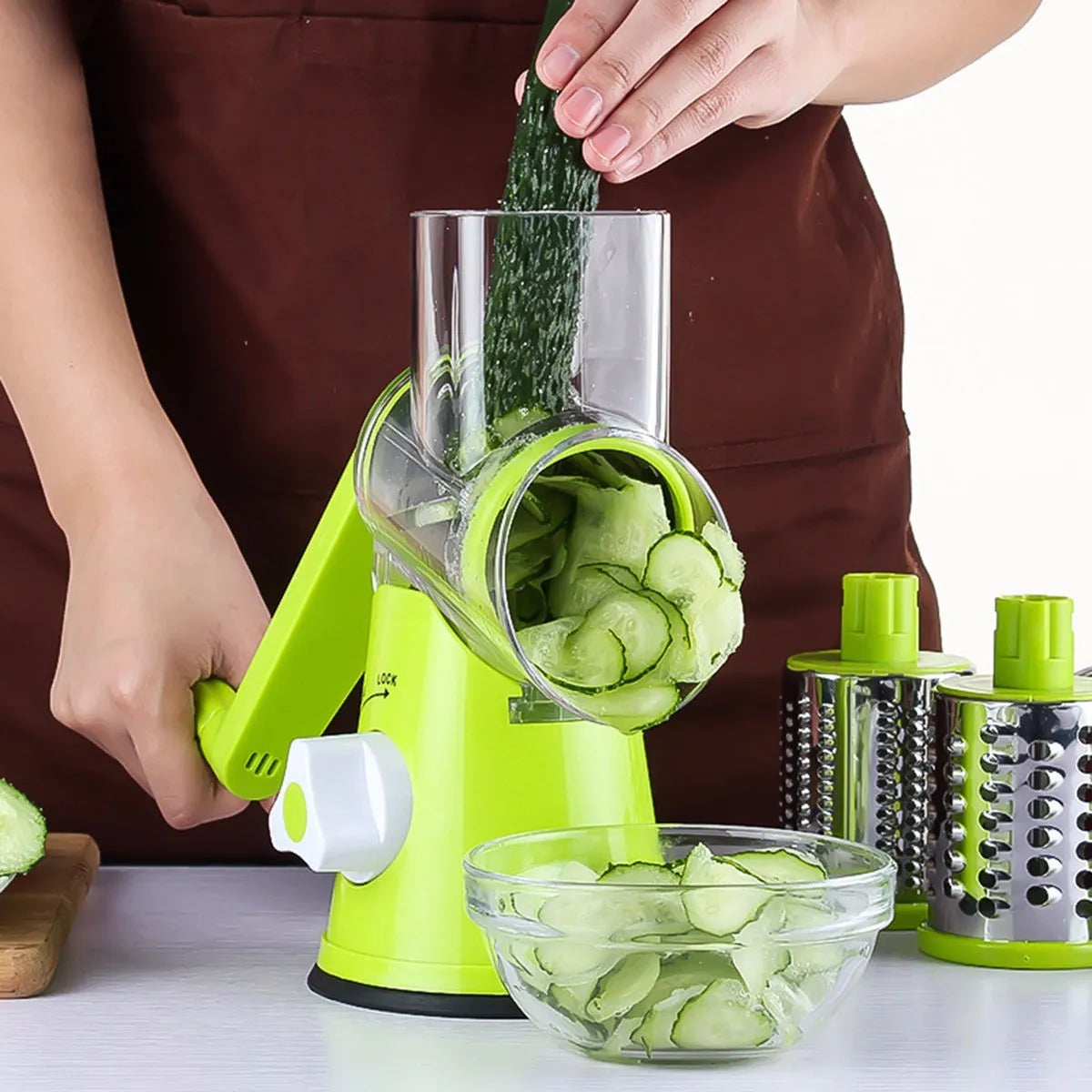 Round mandoline vegetable cutter with 3 stainless steel drum blades and suction base