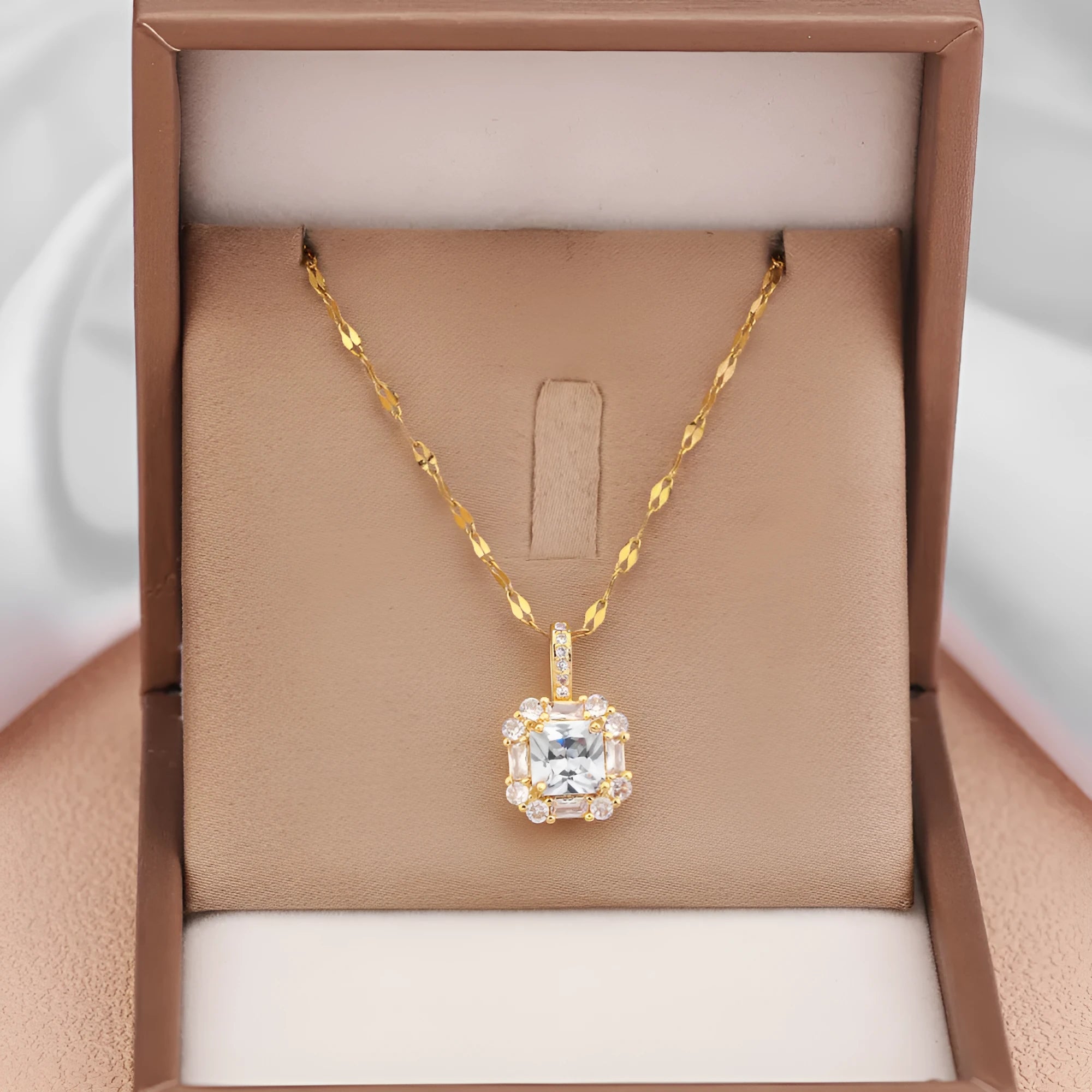 Women's titanium steel clavicle chain with quadrilateral geometric pendant featuring mixed gem inlaid detailing on water wave chain