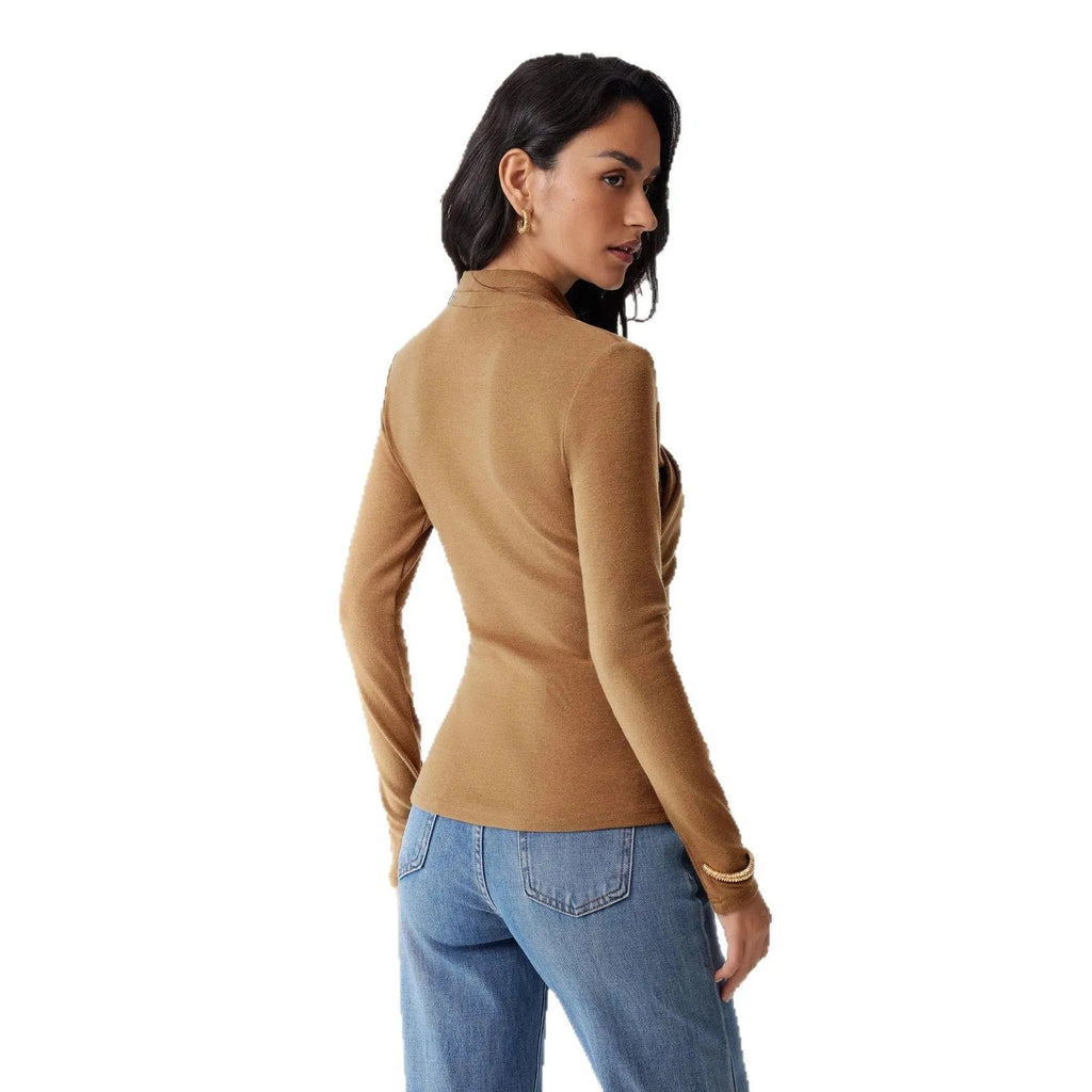 Camel-colour women's slim fit long sleeve pullover sweater on a hanger