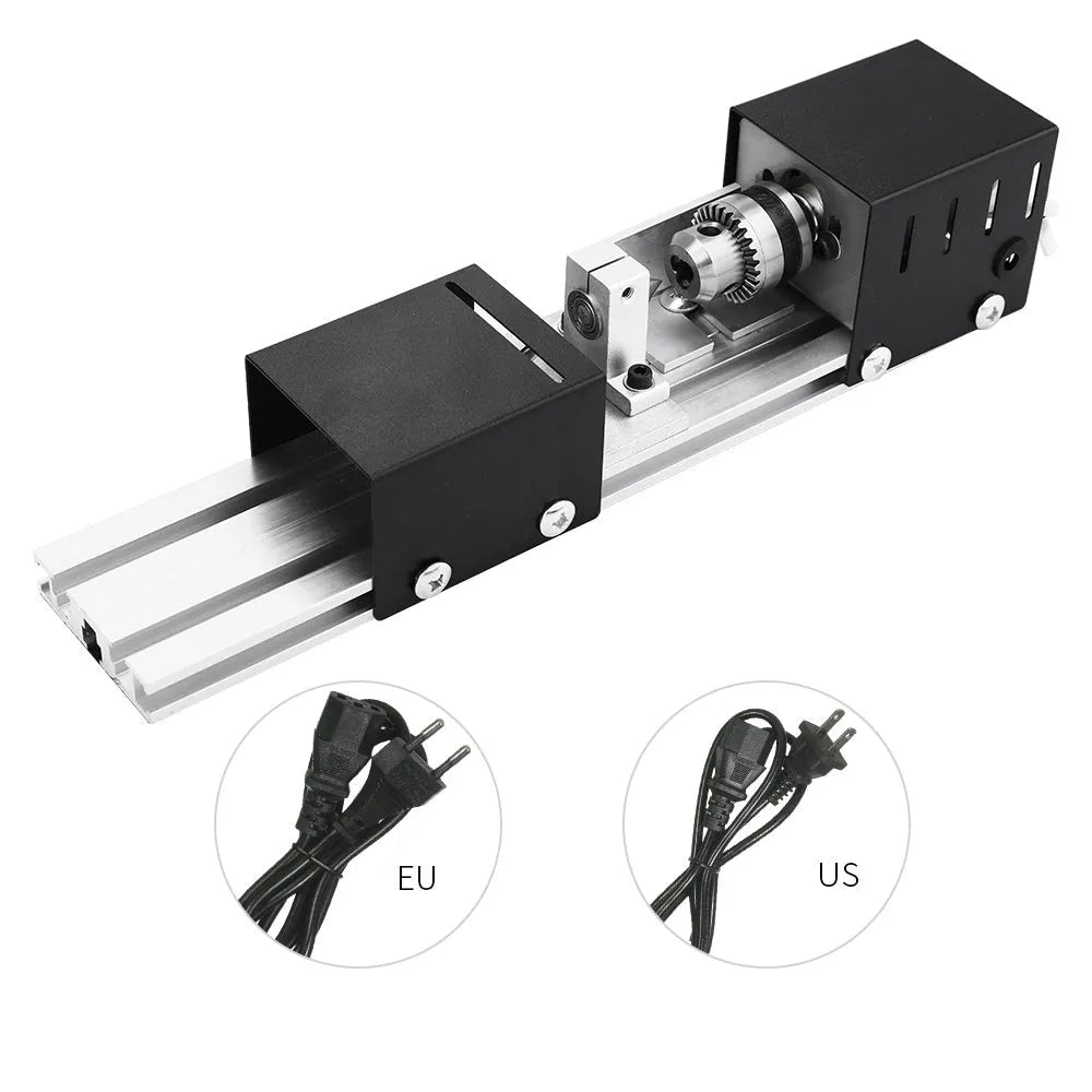 Silver metal mini woodworking lathe with carving knives on workbench