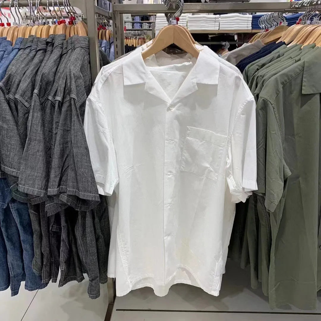 Man wearing a beige open collar modal cotton blend casual shirt with regular sleeves.