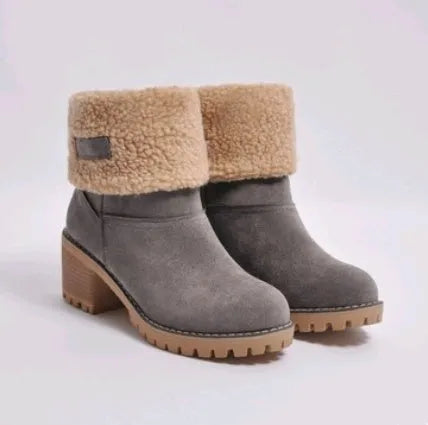 Women's mid-calf suede snow boots with a low heel and round toe in multiple colour options.