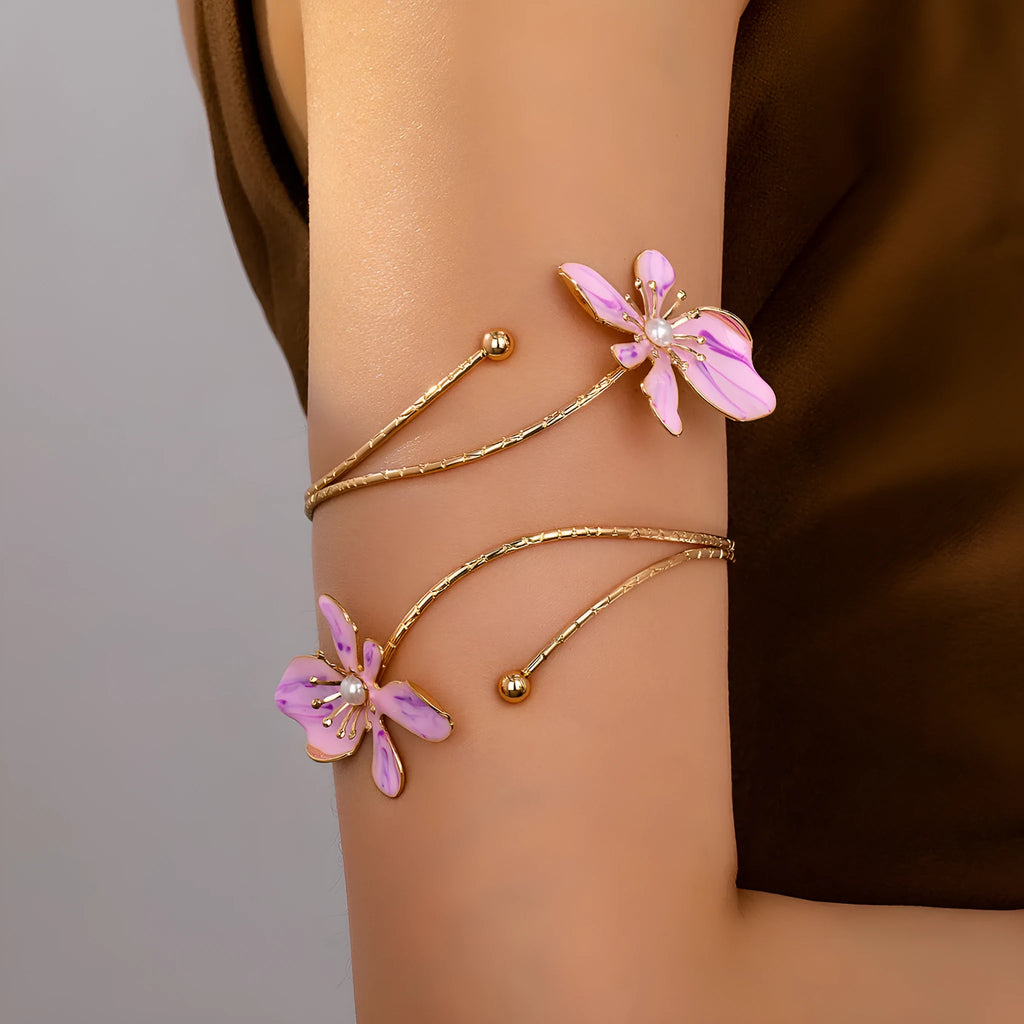 Alloy hollow armband with fashion pattern designs in pink or purple colour options